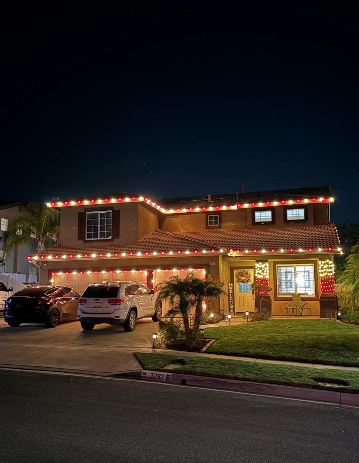Red and white roofline on a two-story home